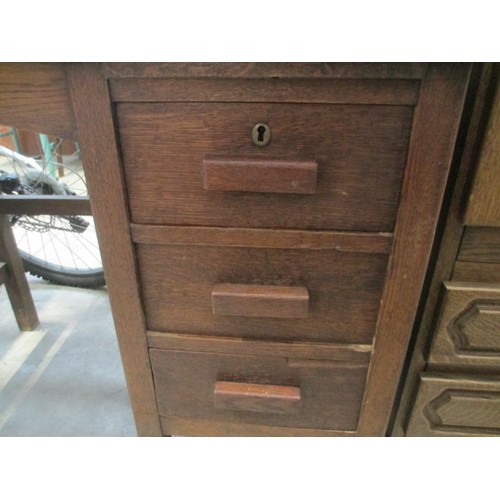 619 - A small vintage oak 3 drawer desk with drop leaf extension