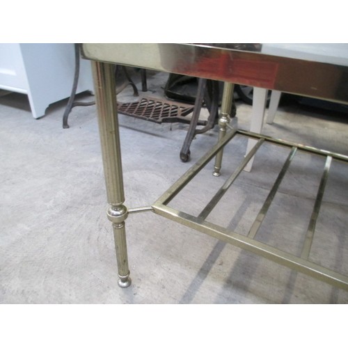 689 - A retro gilt framed coffee table with smoked glass top