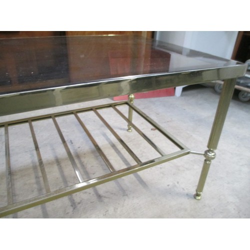 689 - A retro gilt framed coffee table with smoked glass top