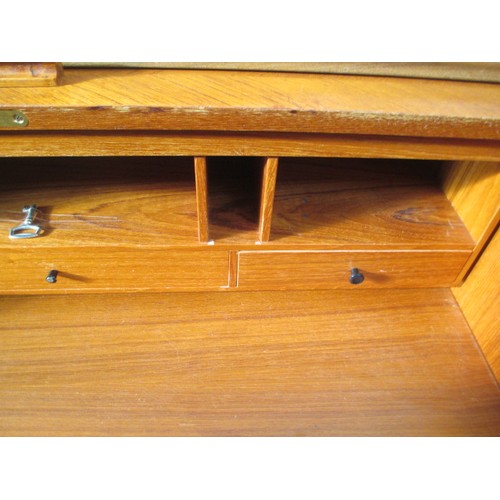 694 - A retro teak roll top bureau with 3 drawer base