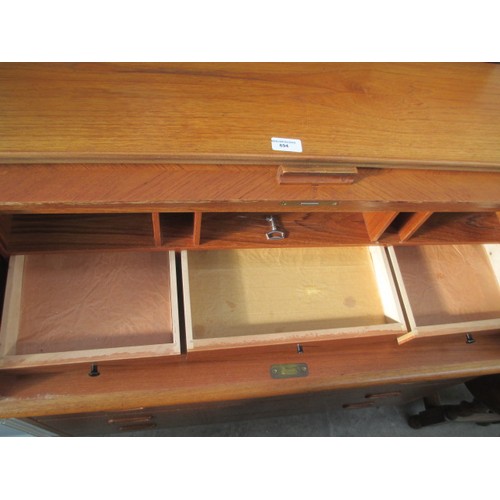 694 - A retro teak roll top bureau with 3 drawer base