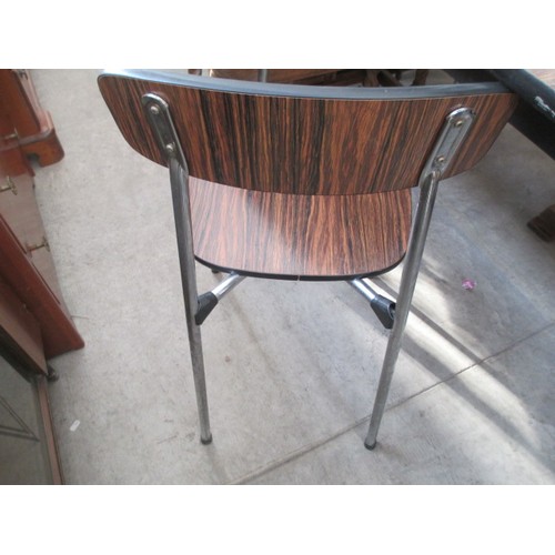 696 - A retro chromed frame dining/breakfast table and 3 x chairs