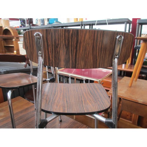 696 - A retro chromed frame dining/breakfast table and 3 x chairs