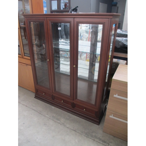 A modern glazed 3 door G PLAN cabinet with 3 lower drawers