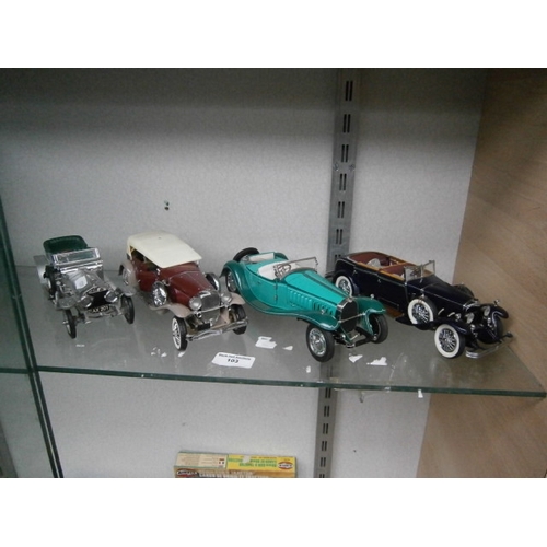 103 - Four Franklin Mint model cars