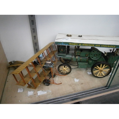 111 - Model steam locomotive and bi-plane