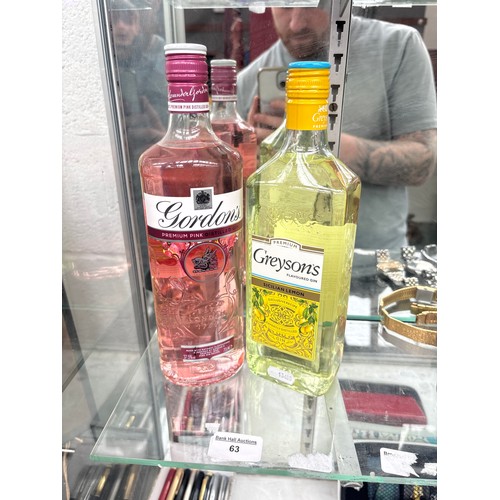 63 - Unopened 70cl bottles of Gordon's Pink Premium and Greysons Sicilian Lemon gin