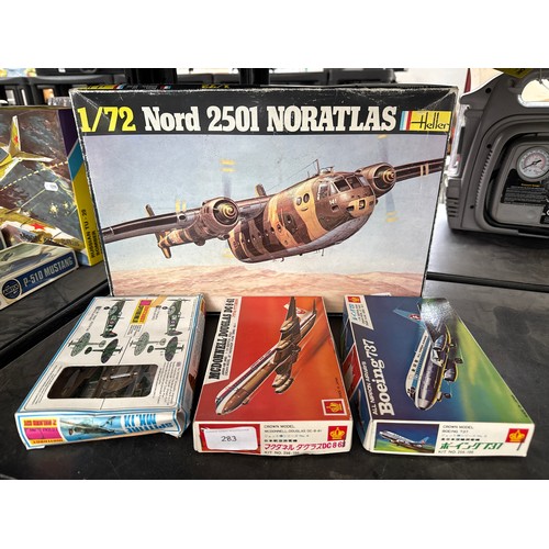 Four assorted model kits