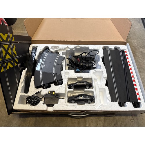 Scalextric Quantum of Solace race set with two extra race cars. In full ...