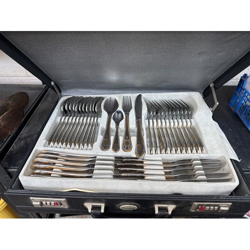 39 - Decorative cased set of cutlery