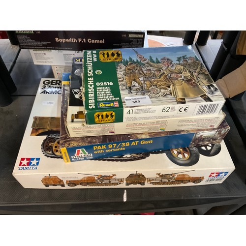 Four assorted military model kits