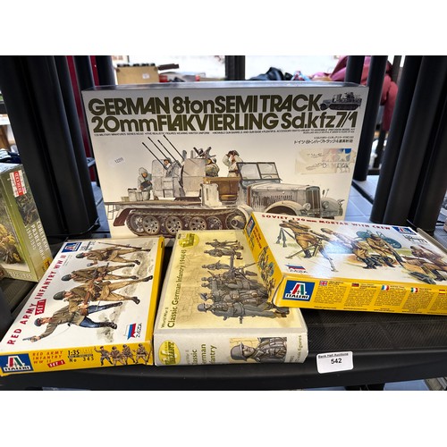 Four military model kits