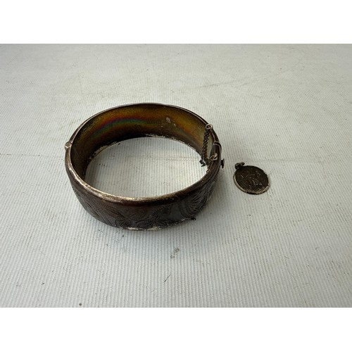 22 - Silver hallmarked bracelet and pendant, 

weight 38 grams