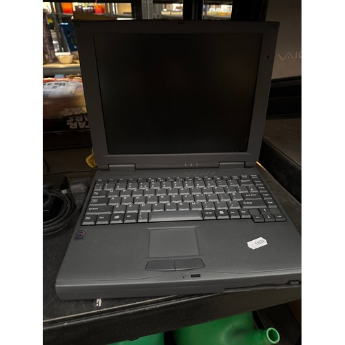 208 - Old laptop with charger