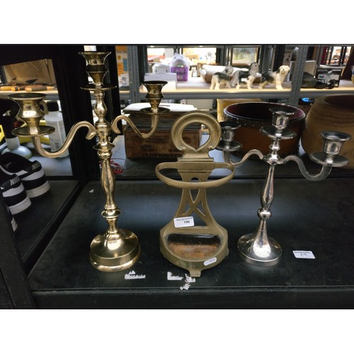 196 - Two metal candelabras and brass companion set holder
