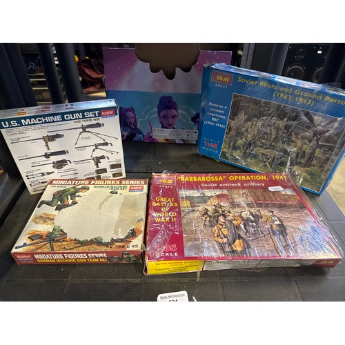 Four military model kits