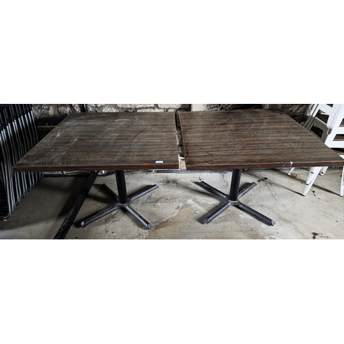 68 - Two square tables, both with cast-iron bases (2)