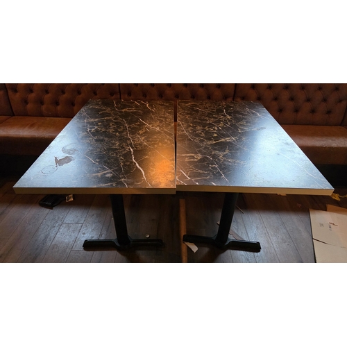 47 - Seven tables with cast-iron bases.