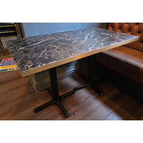 47 - Seven tables with cast-iron bases.