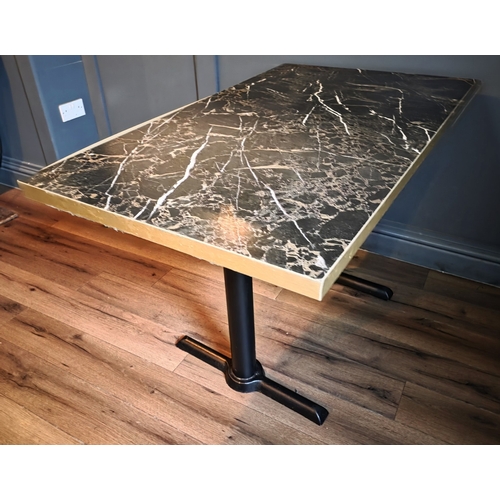 47 - Seven tables with cast-iron bases.