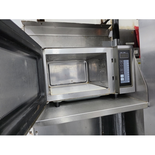 13 - Quatro microwave and two stainless steel shelves (to be unscrewed by buyer)