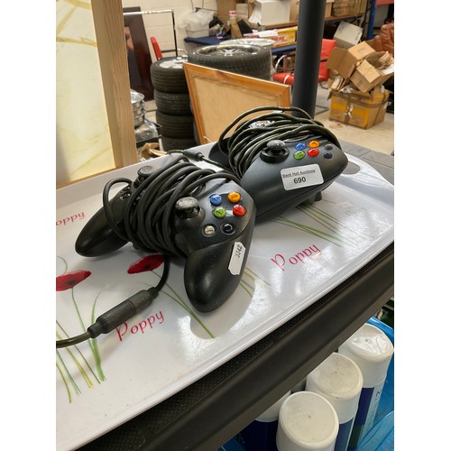 Two Xbox controllers