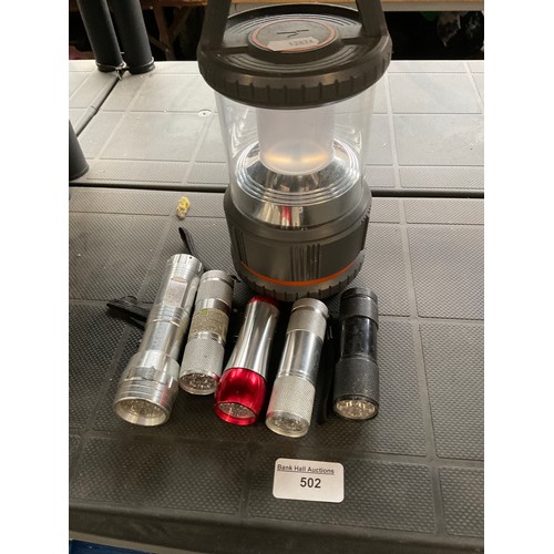 Camping lantern and five torches