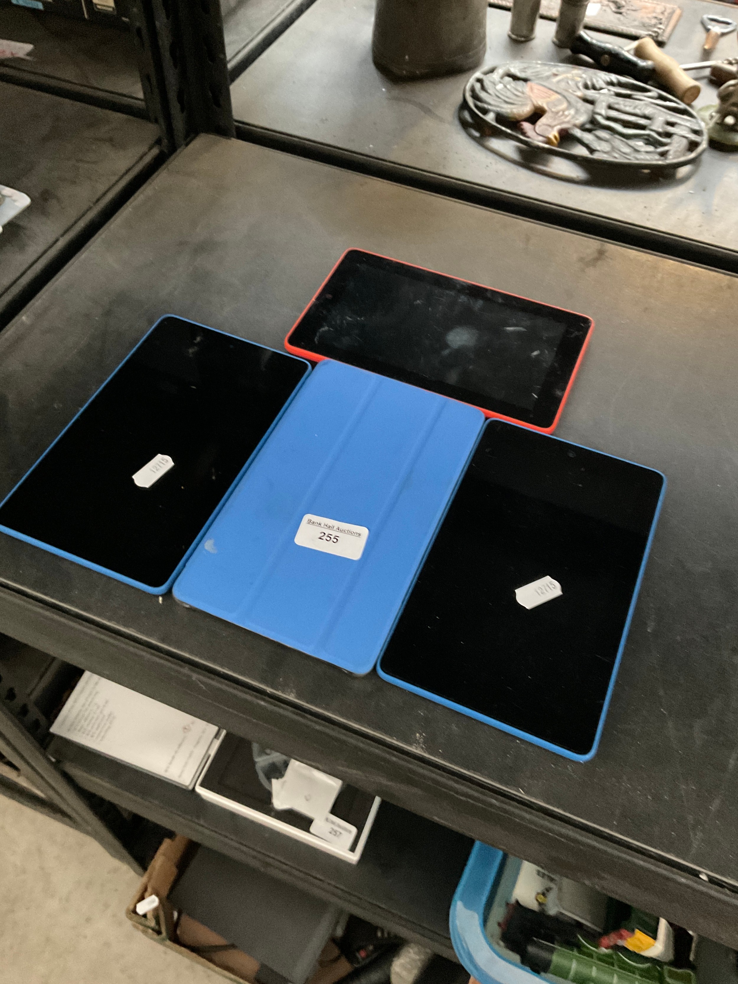 Four assorted tablets