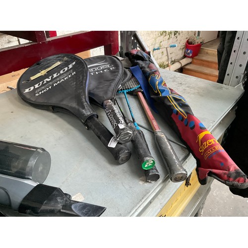 Five sports rackets and hockey stick
