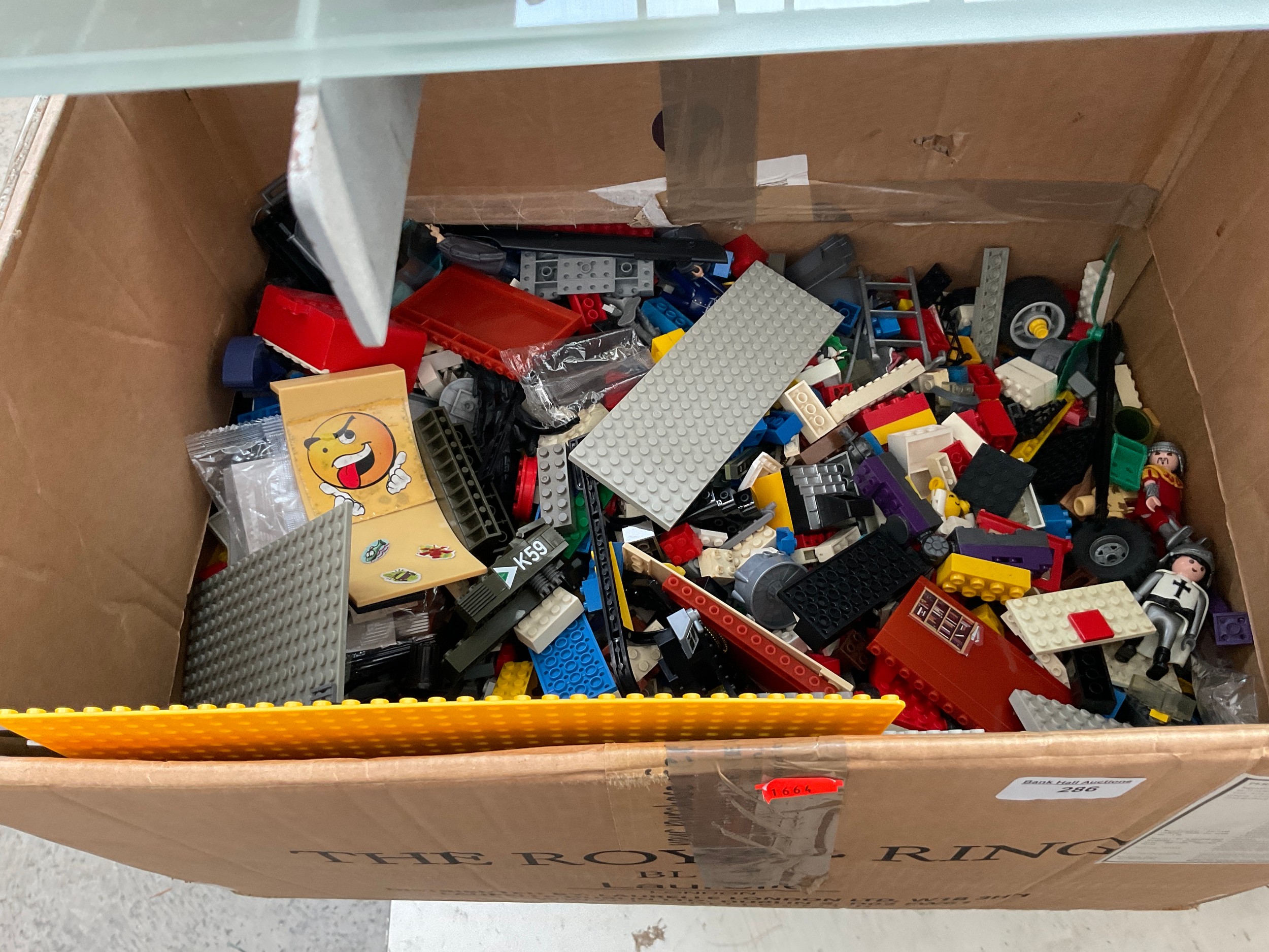 Box of Lego and Lego type pieces