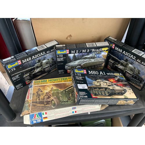 Five military model kits