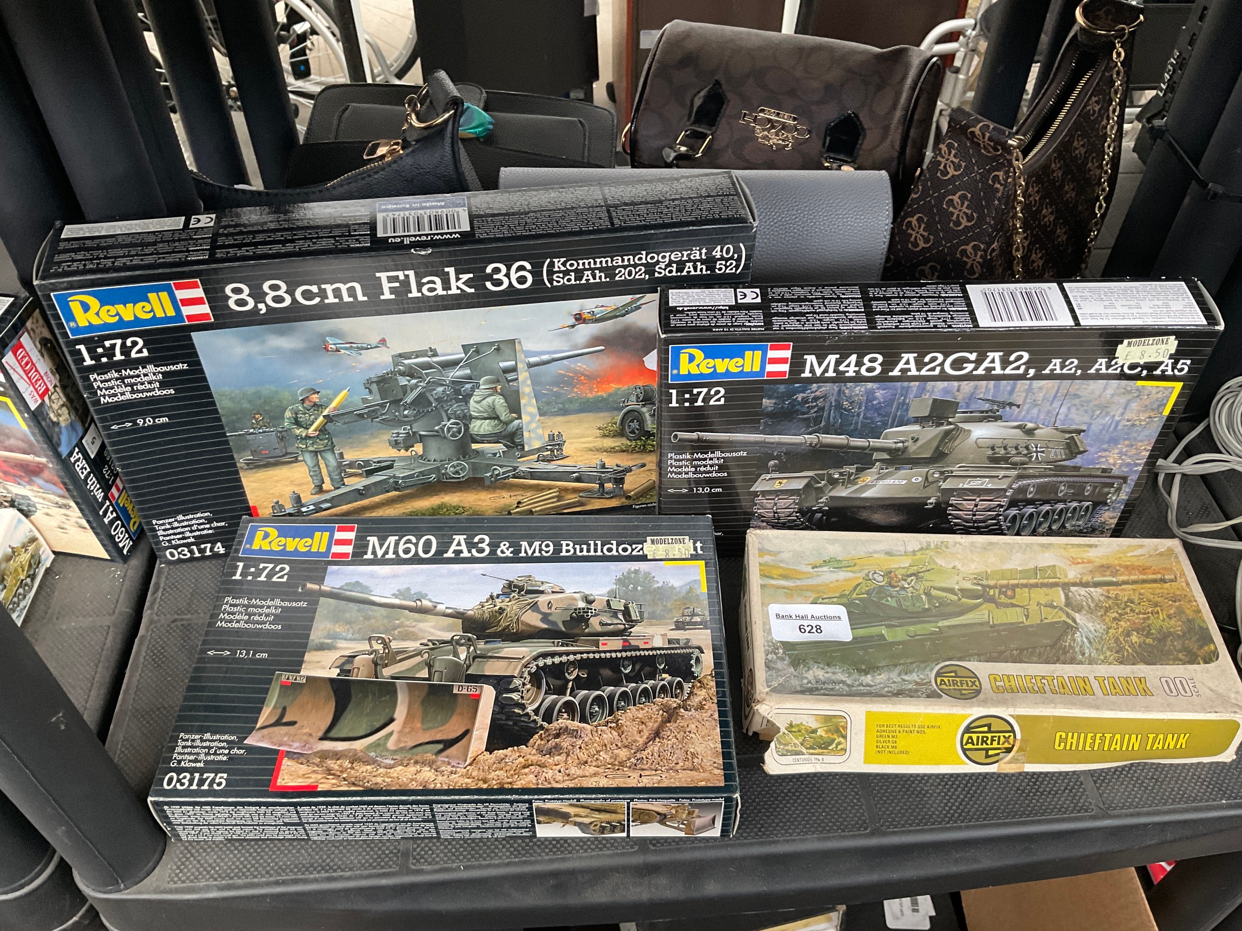 Four military model kits