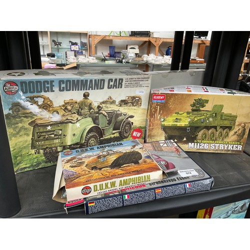 Four military model kits