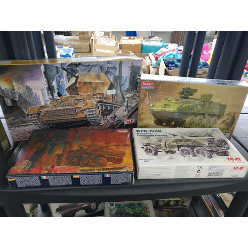 Four military model kits