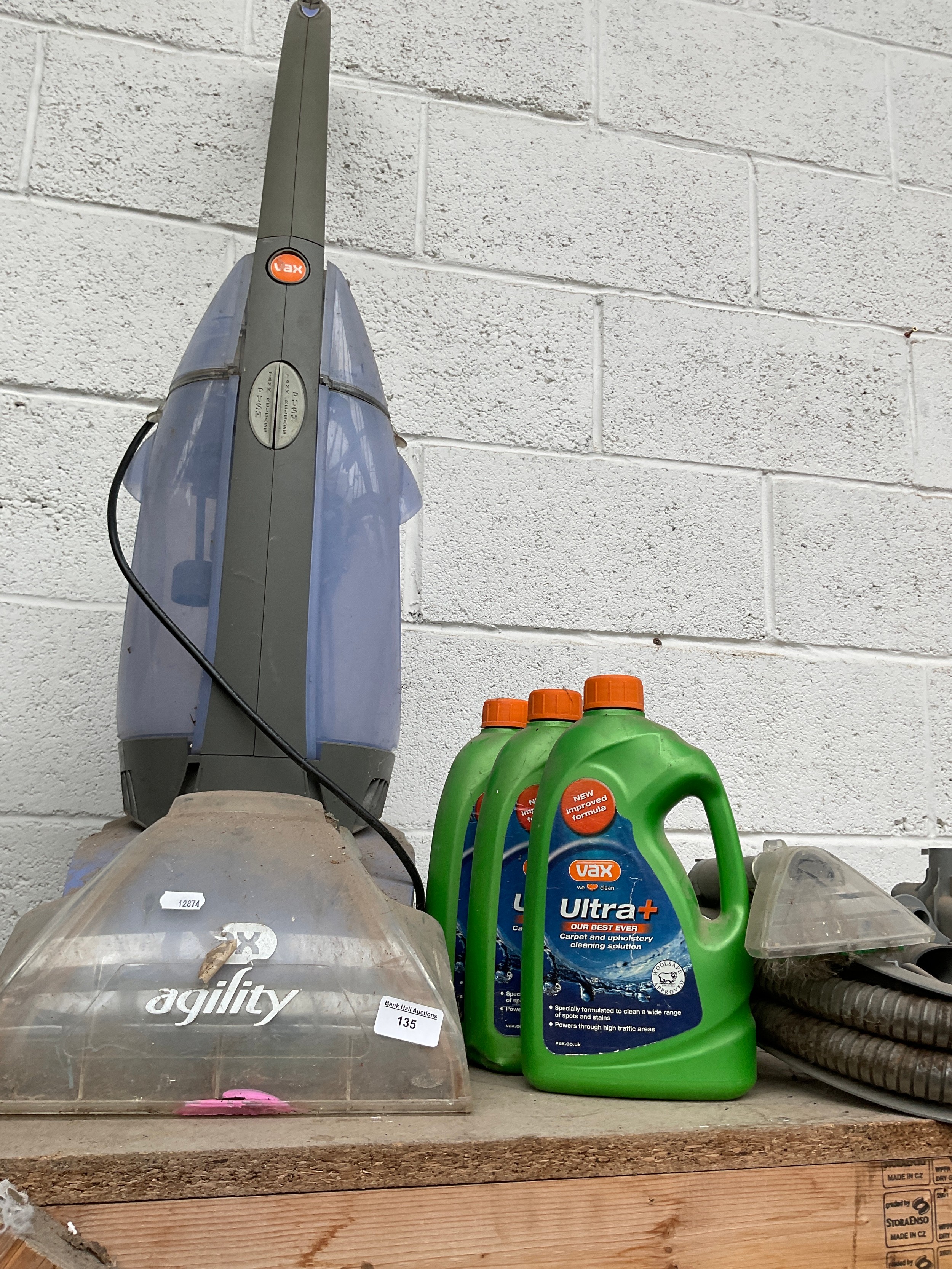 Vax carpet cleaner with three bottles of carpet cleaner