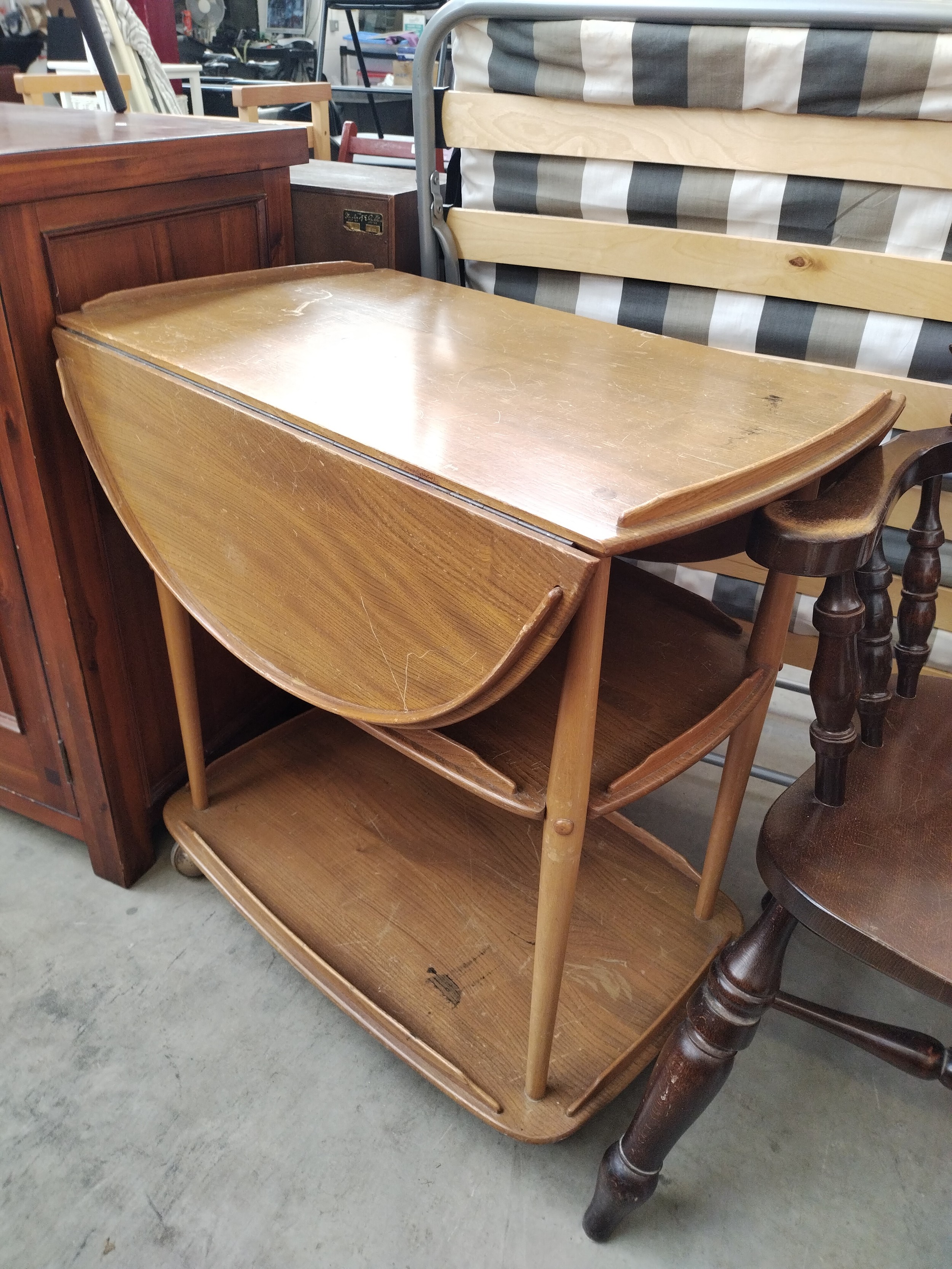 A retro 3 tier drop leaf ERCOL trolley