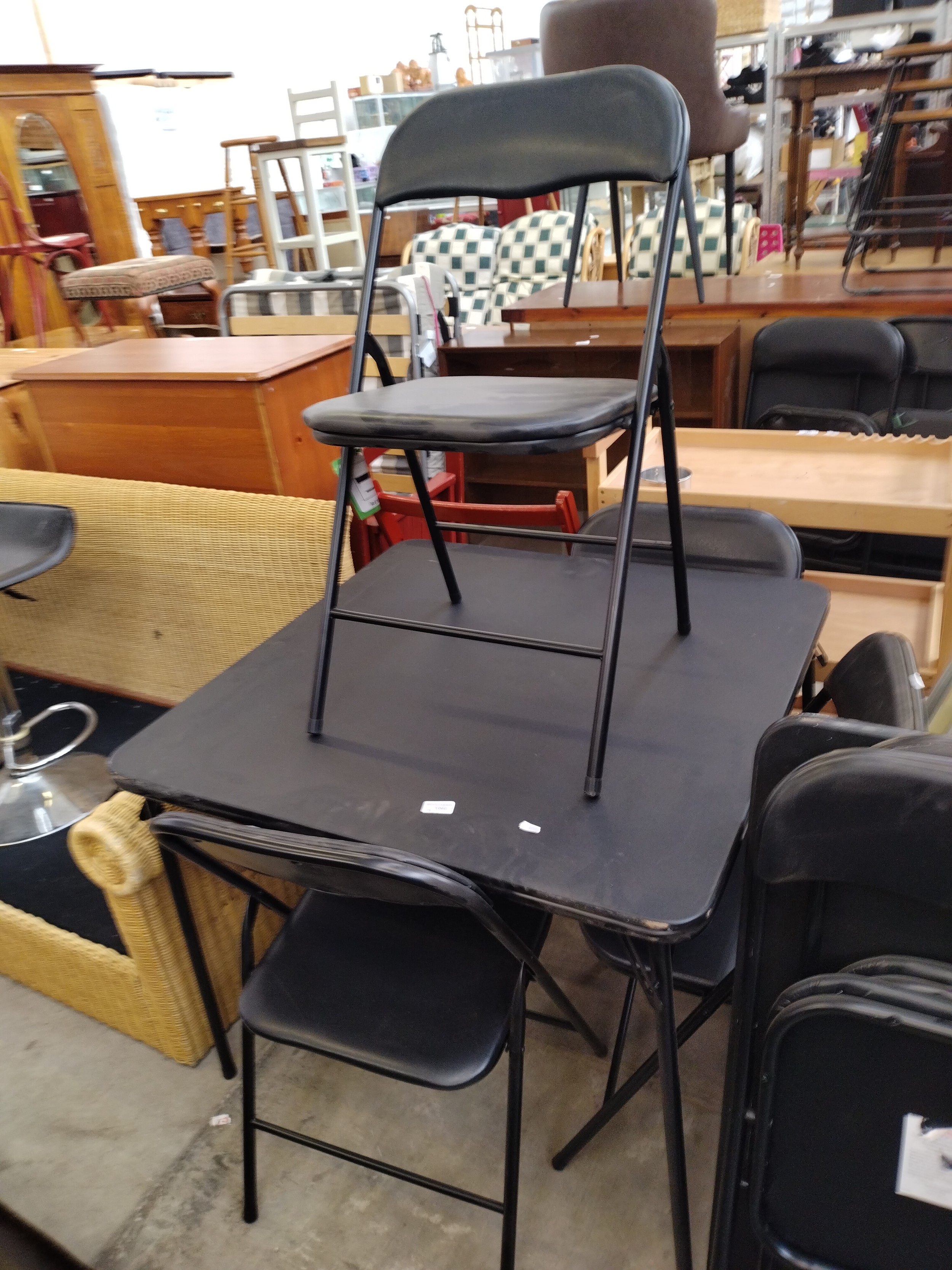 A metal framed folding camping/patio table and 4 x matching chairs