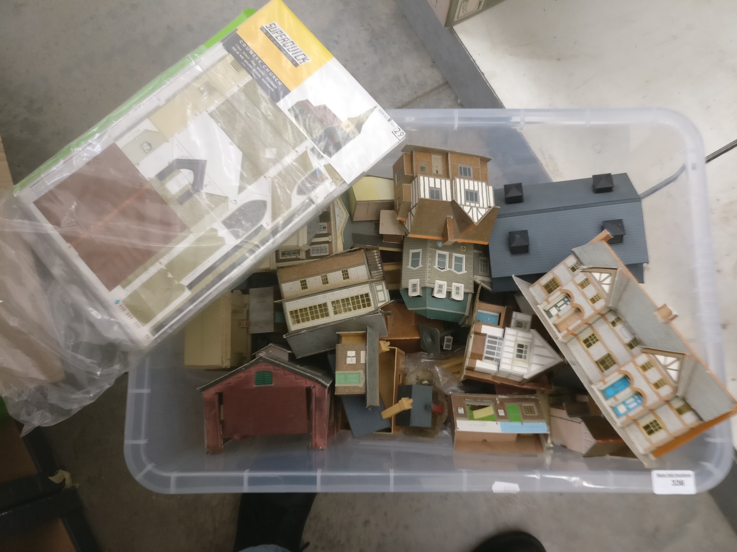 Box of model rail buildings