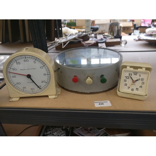 Small clock and two stopwatch clocks