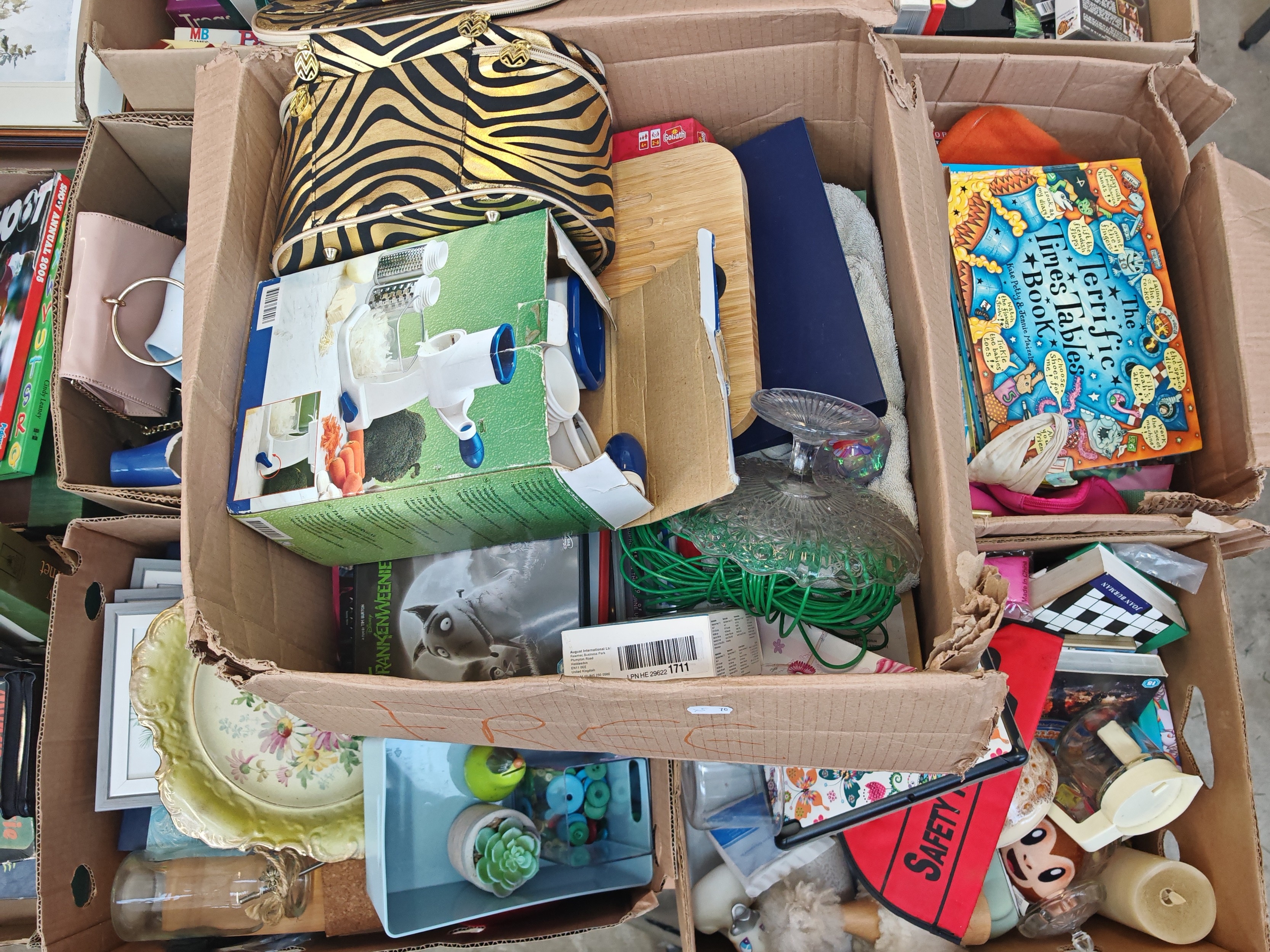 Five boxes of unsorted household items