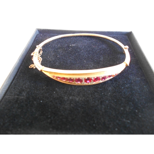 20 - Victorian 9ct Gold Bangle eith Red Stones,(Ruby or Garnet)