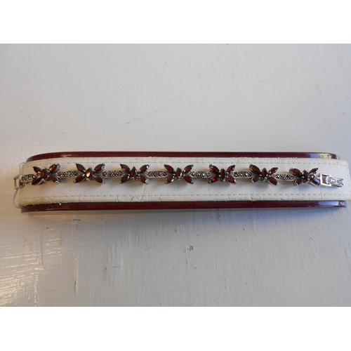 59 - Heavy Silver Ladies Garnet Bracelet