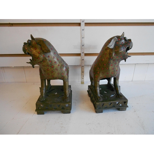 29 - Unusual Pair of Bronze Chinese Foo Dogs with Glass Eyes