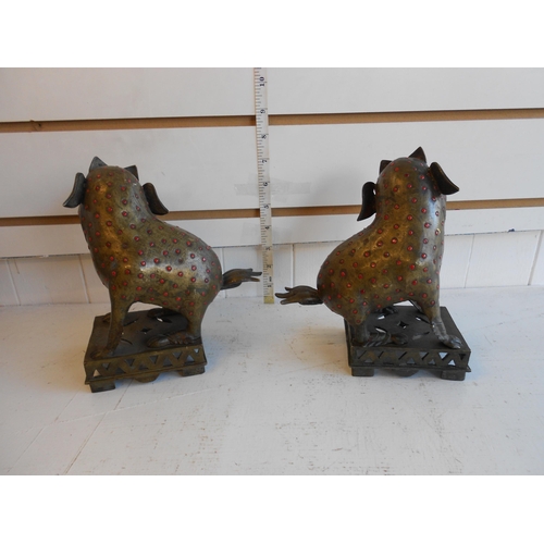 29 - Unusual Pair of Bronze Chinese Foo Dogs with Glass Eyes