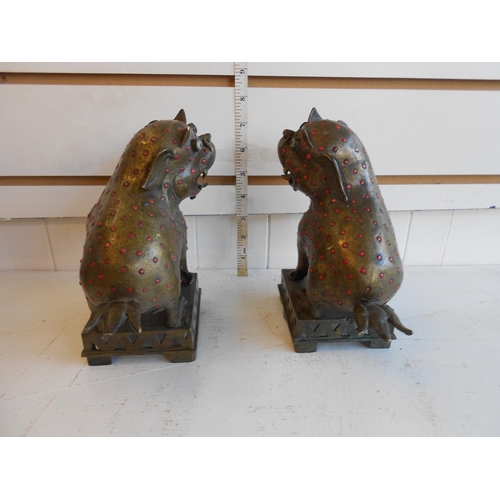 29 - Unusual Pair of Bronze Chinese Foo Dogs with Glass Eyes