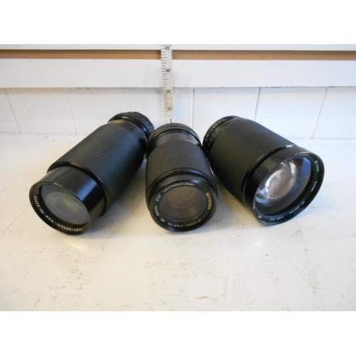 31 - 3 Assorted Camera Lenses