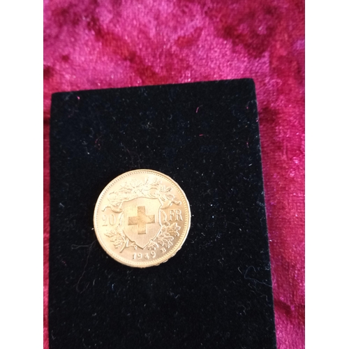 131 - 22ct Gold 20 Franc Coin 1949