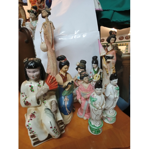 371 - 8 Assorted Chinese Figurines