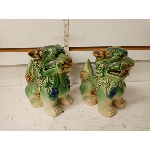 395 - Pair of Green Pottery Foo Dogs