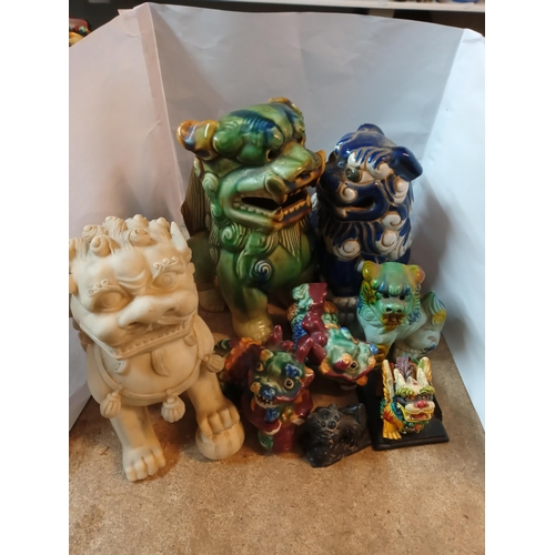 423 - 8 Assorted Foo Dogs